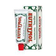 ProtoClinical k-beauty EUTHYMOL Original Toothpaste 106g single upright beige toothpaste package centered on a pale pink and cream background.