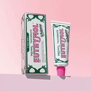 ProtoClinical k-beauty EUTHYMOL Whitening Toothpaste 106g single upright pink toothpaste package centered on a pale mint and pink background.