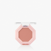 ProtoClinical k-beauty terracotta pink beauty close-up with a centered darker vertical form on a pale blue and white background.