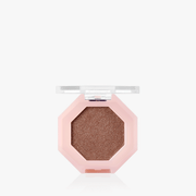 ProtoClinical k-beauty warm copper and beige beauty close-up with a centered darker vertical form on a pale blue and white background.