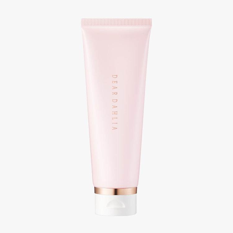 ProtoClinical k-beauty DEAR DAHLIA Heavenly Facial Cleanser pastel gradient graphic with a soft pink vertical glow and pale green side shading on a light background.
