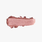 ProtoClinical k-beauty DEAR DAHLIA Perfect Designing Shadow Stick texture shot with a soft pink horizontal shadow swatch on a white background