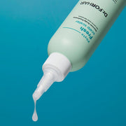 ProtoClinical k-beauty blue beauty graphic with a soft pale diagonal glow and muted green upper shading.