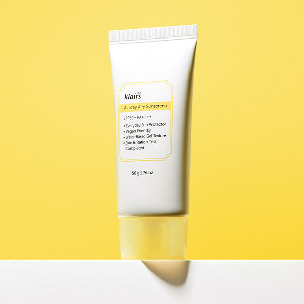 ProtoClinical k-beauty KLAIRS All-day Airy Sunscreen SPF50+ PA++++ 50g single upright white sunscreen tube on a bright yellow background with a soft gray shadow