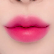 ProtoClinical k-beauty espoir Nowear Lipstick Volume Matte 3g (8 colors) close-up of centered lips with a soft blurred gradient and vivid fuchsia-pink lip color
