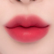 ProtoClinical k-beauty espoir Nowear Lipstick Volume Matte 3g (8 colors) close-up of centered lips with a soft blurred gradient and bright coral-pink lip color