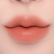 ProtoClinical k-beauty espoir Nowear Lipstick Volume Matte 3g (8 colors) close-up of centered lips with a soft blurred gradient and warm peach-beige lip color