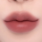 ProtoClinical k-beauty espoir Nowear Lipstick Volume Matte 3g (8 colors) close-up of centered lips with a soft blurred gradient and muted mauve-rose lip color