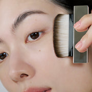 ProtoClinical k-beauty HERA Airy Power Primer 8.5g warm beige beauty close-up with soft brown accents.
