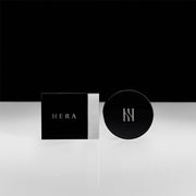 ProtoClinical k-beauty HERA Airy Power Primer 8.5g dark primer compact with beige primer swatches on a light background.