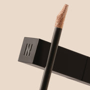 ProtoClinical k-beauty HERA Creamy Cover Concealer 7.5g 13N1 PORCELAIN concealer detail with dark and beige tones on a light background.