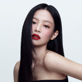 ProtoClinical k-beauty HERA Rouge Classy 3.5g red lipstick silhouette with pale aqua side bands on a light background.