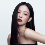 ProtoClinical k-beauty HERA Rouge Classy 3.5g red lipstick silhouette with pale aqua side bands on a light background.