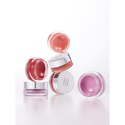 ProtoClinical k-beauty HERA Sensual Lip & Cheek 7g makeup detail in warm rose-red tones on a light background.