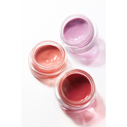 ProtoClinical k-beauty HERA Sensual Lip & Cheek 7g makeup detail in warm beige and rose tones on a light background.
