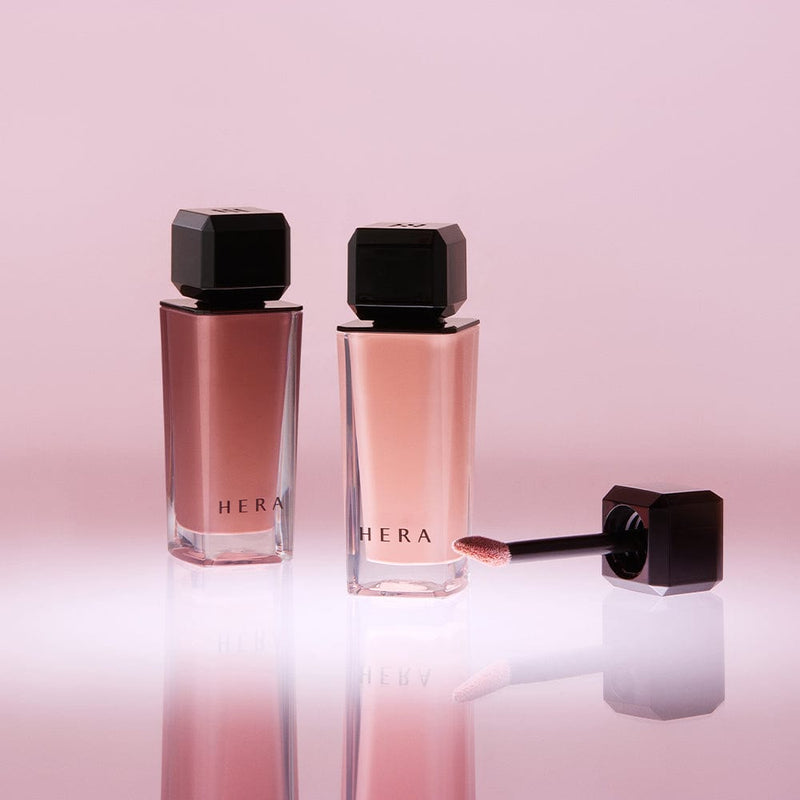 ProtoClinical k-beauty HERA Sensual Nude Gloss 5g glossy lip color detail in warm rosy tones on a light background.