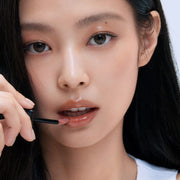 ProtoClinical k-beauty HERA Sensual Nude Gloss 5g glossy lip color detail in muted mauve tones on a light background.