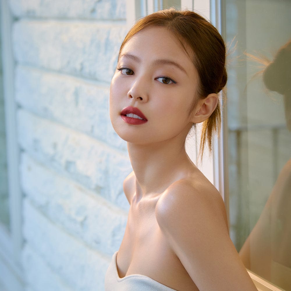 ProtoClinical k-beauty HERA Sensual Powder Matte Lipstick 3g beauty campaign image with blue side accents and a warm brown center on a light background.