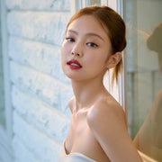 ProtoClinical k-beauty HERA Sensual Powder Matte Lipstick 3g beauty campaign image with blue side accents and a warm brown center on a light background.