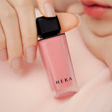 ProtoClinical k-beauty HERA Sensual Powder Matte Liquid 5g soft pink and beige makeup detail on a light background.