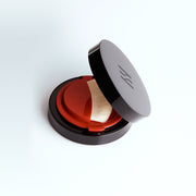 ProtoClinical k-beauty HERA Skin Tint Comfy Spreader SPF50/ PA++++ 15g rounded product silhouette on a light background.