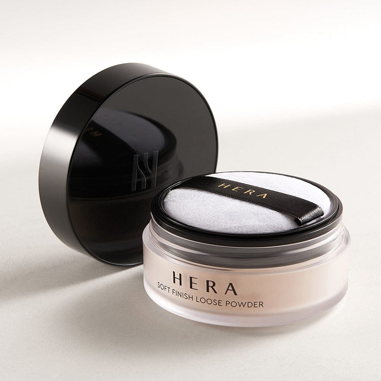 ProtoClinical k-beauty HERA Soft Finish Loose Powder 15g open loose powder compact on a soft beige background.