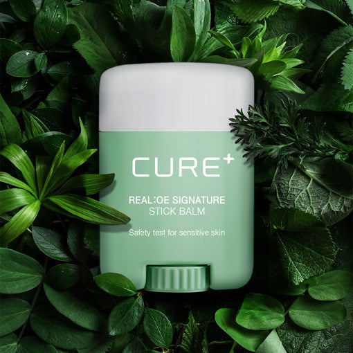 ProtoClinical k-beauty [KIM JEONG MOON Aloe] Cure Realoe Signature Stick Balm 14g as a single upright light green stick balm centered on a dark green background