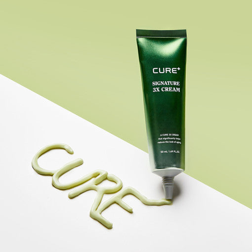 ProtoClinical k-beauty [KIM JEONG MOON Aloe] Cure+ Signature 3X Cream 50ml as a single dark green cream package centered upright on a pale green background