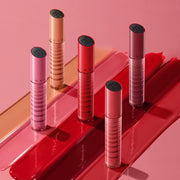 ProtoClinical k-beauty JUNGSAEMMOOL LIP-PRESSION Glow Lasting Tint 4g deep berry beauty graphic with a darker diagonal center on a pink background.