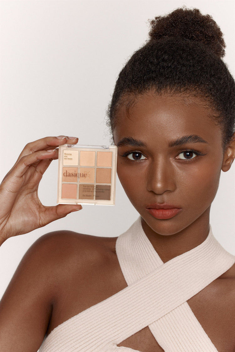 ProtoClinical k-beauty dasique Eyeshadow Palette - 12 Warm Blending shown in warm tan and brown tones on a white background.