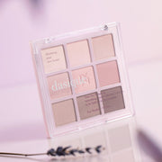 ProtoClinical k-beauty dasique Eyeshadow Palette - 13 Cool Blending shown in soft lavender and mauve tones on a white background.