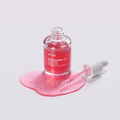 Anua Niacinamide 10% + TXA 4% Serum 30ml bottle on pale mint and pink background