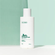 ProtoClinical k-beauty VT Cica Essence Sun 100ml SPF50+/PA++++ pale mint product silhouette with soft green side tones on a light background