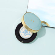 ProtoClinical k-beauty dark gray beauty product silhouette with pale blue side tones on a light background.