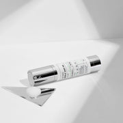 ProtoClinical k-beauty beauty product with soft blue and warm neutral tones on a light background.
