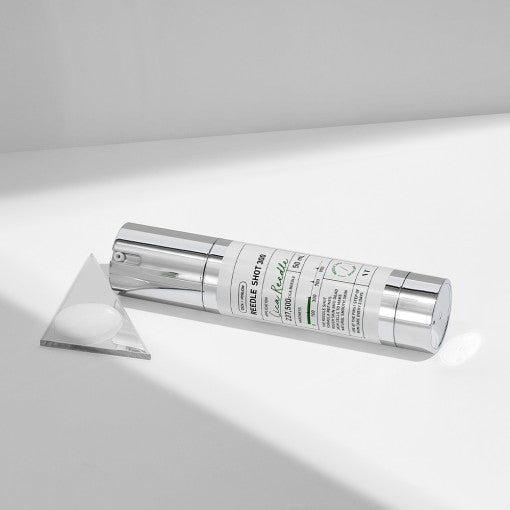 ProtoClinical k-beauty VT Reedle Shot 300 50ml detail image with warm brown and cool gray tones.