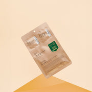 ProtoClinical k-beauty VT Vita-Light All In One 3step Mask 1.5g+24g+1.5g shown as a single rounded tan package centered on a warm peach background with lighter side panels
