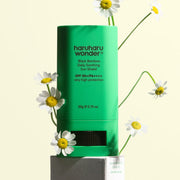 ProtoClinical k-beauty tall green beauty product silhouette with pale pink side accents on a light background.