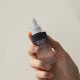 ProtoClinical k-beauty beige beauty product silhouette with olive and brown lower accents on a light background.