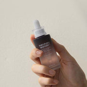 ProtoClinical k-beauty beige beauty product silhouette with olive and brown lower accents on a light background.