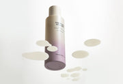 ProtoClinical k-beauty pale beige beauty product silhouette with a soft gray center on a white background.