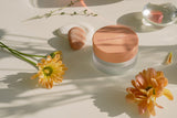 ProtoClinical k-beauty beige beauty graphic with soft olive and tan blocks on a light background.