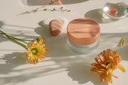 ProtoClinical k-beauty beige beauty graphic with soft olive and tan blocks on a light background.