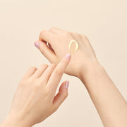 ProtoClinical k-beauty warm beige beauty bottle silhouette on a soft beige background.