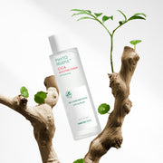 ProtoClinical k-beauty soft beige beauty bottle silhouettes with two dark vertical forms on a white background.