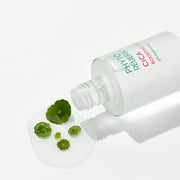 ProtoClinical k-beauty pale white beauty bottle silhouette with a charcoal lower section on a light background.