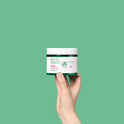 ProtoClinical k-beauty mint green beauty graphic with a pale central glow on a turquoise background.