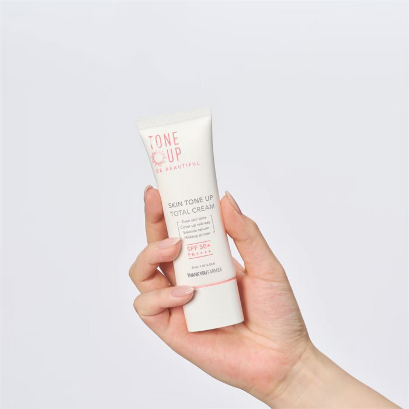 ProtoClinical k-beauty pale blue beauty graphic with a warm beige center and soft peach lower tones on a light background.