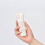 ProtoClinical k-beauty pale blue beauty graphic with a warm beige center and soft peach lower tones on a light background.