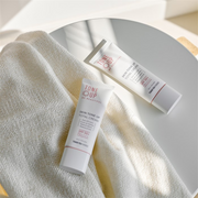 ProtoClinical k-beauty warm gray beauty graphic with a vertical beige center on a light background.